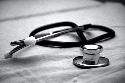 black and white stethoscope | concierge counseling in Maryland for creative people by Cindy Cisneros