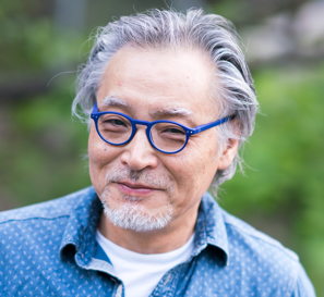 Creative Person Asian Adult Male in Blue Glasses | Person Centered Therapy for Creative Individuals find Inner Peace and Happiness